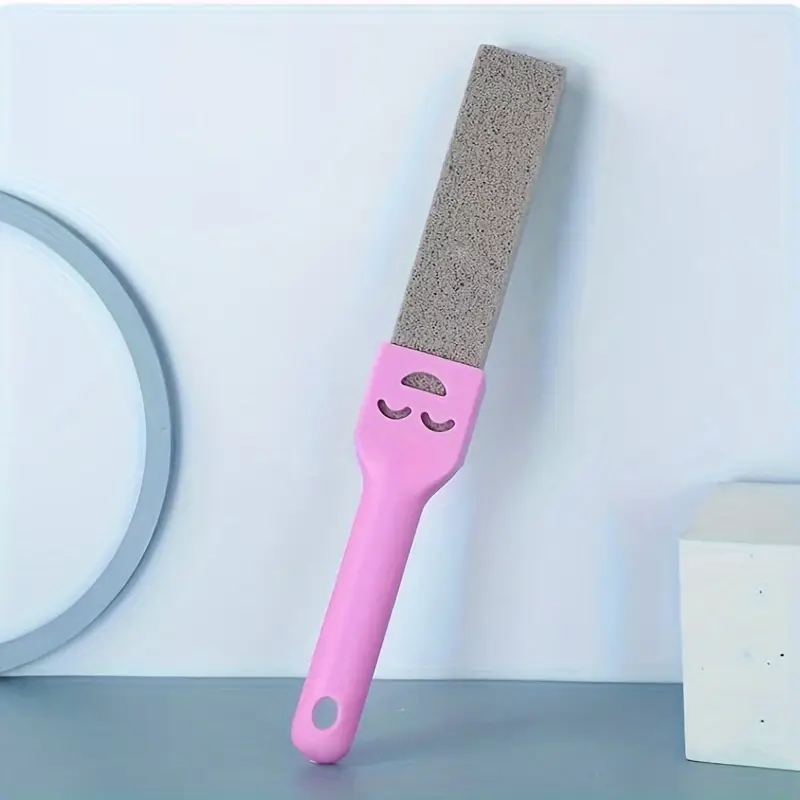 Brosse de toilette violette en pierre ponce avec smiley